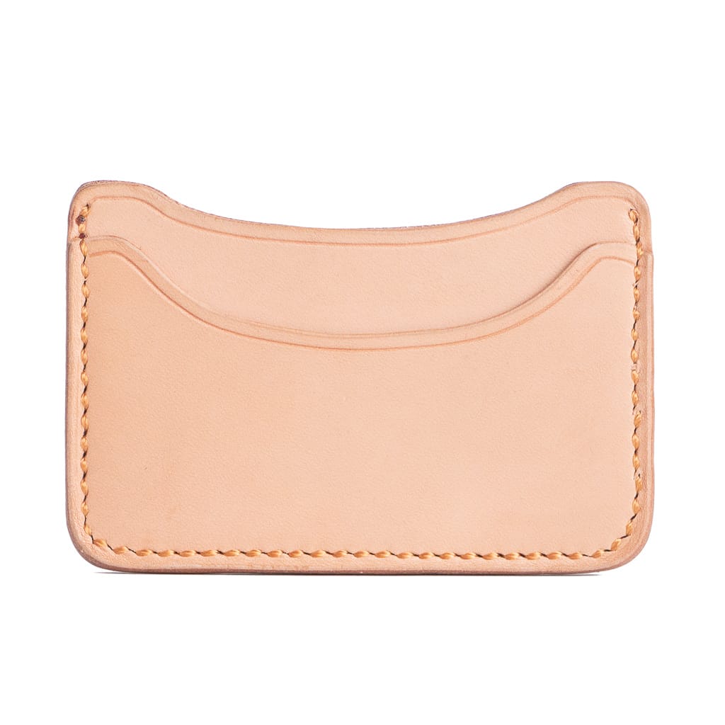 Vegetable tanned card wallet on white background. Made by Reed Leatherware. 