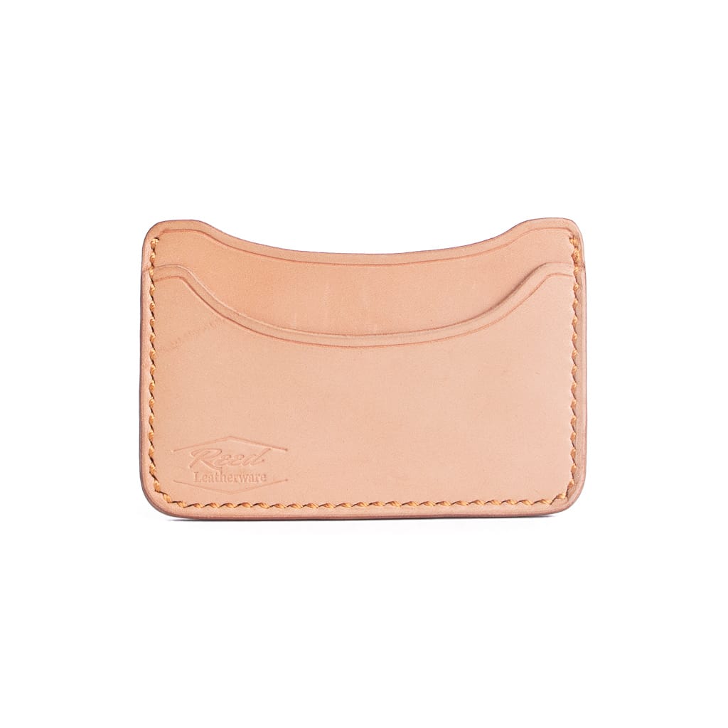 Vegetable tanned card holder named the rooster on a white background. 