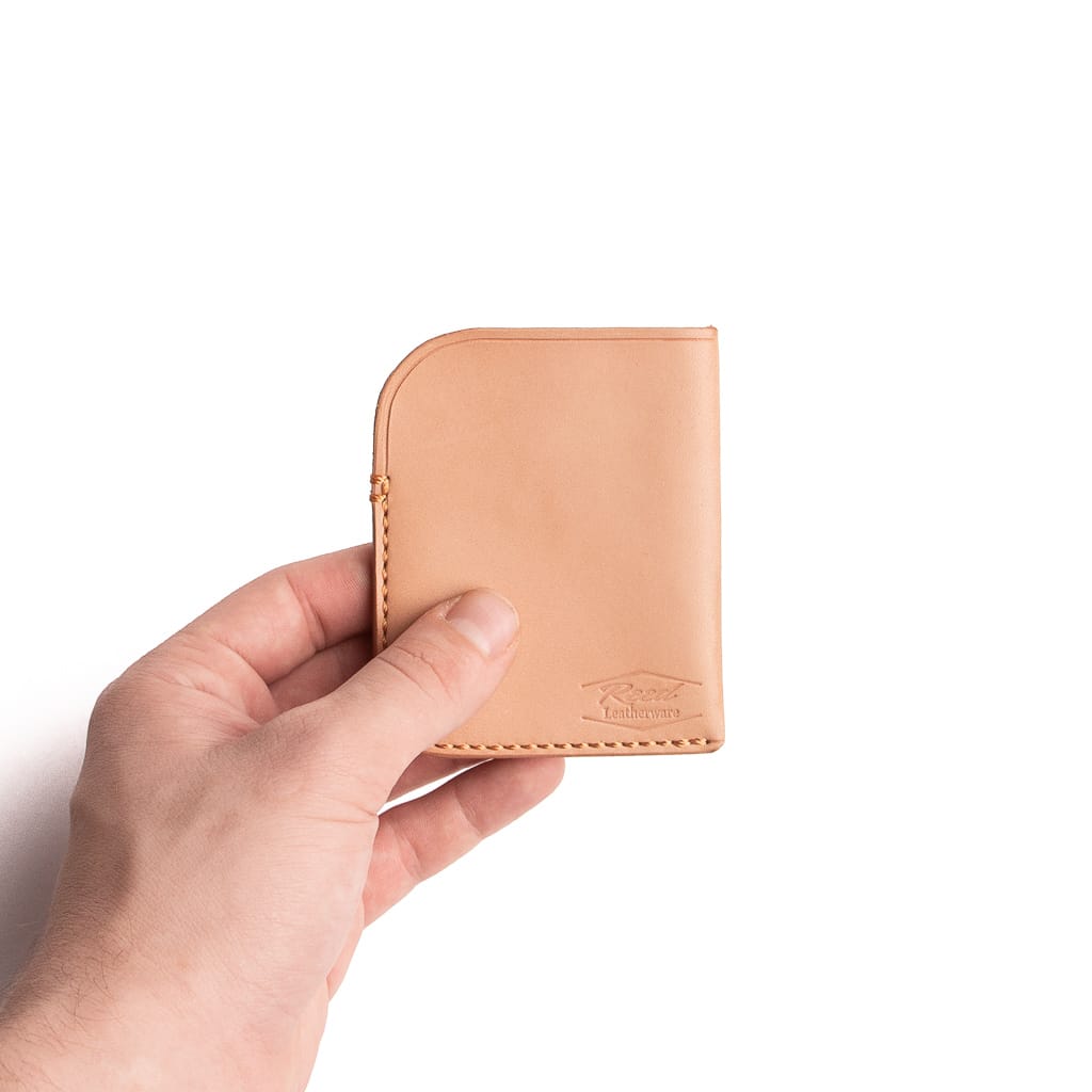 small vegetable tanned minimalist wallet made by Reed Leatherware.  The wallet sits on a white background. 